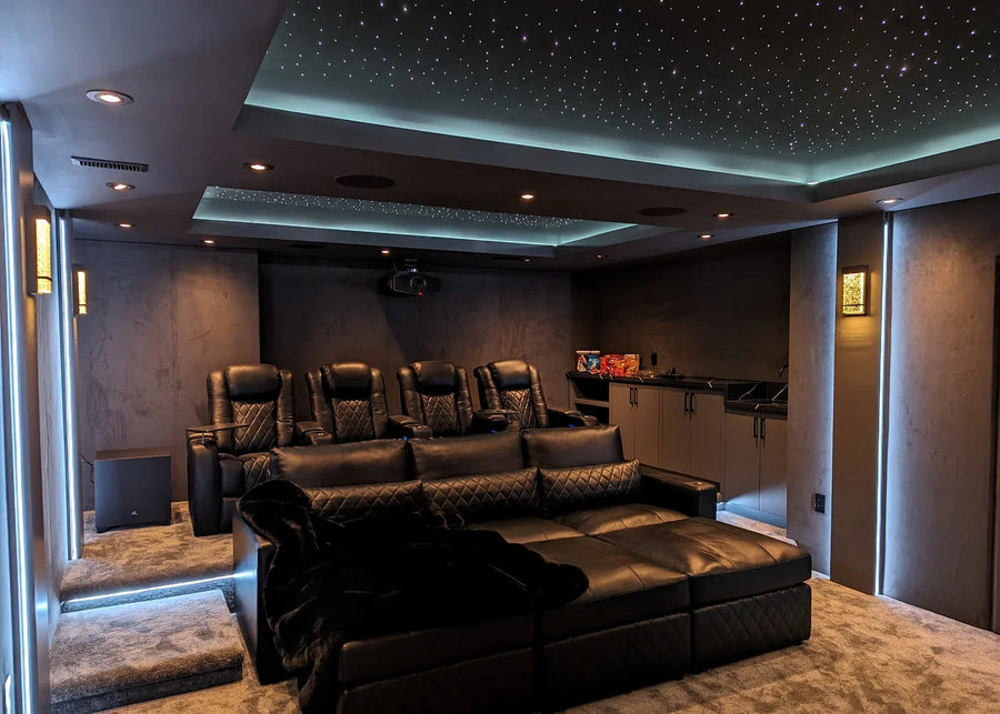Fiber optic star ceiling in a home theater with tray ceiling and cove lighting