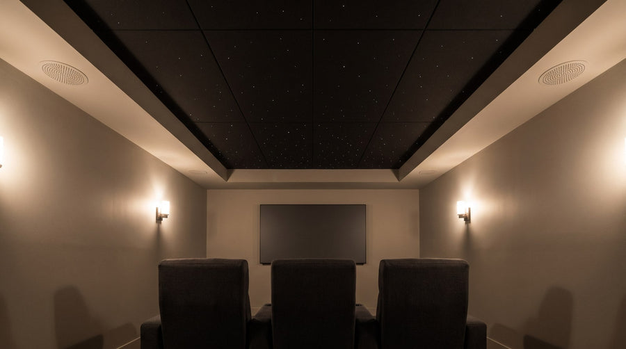 AI-generated concept of a home theater with a star ceiling feature and exposed speaker grilles in a separate ceiling border