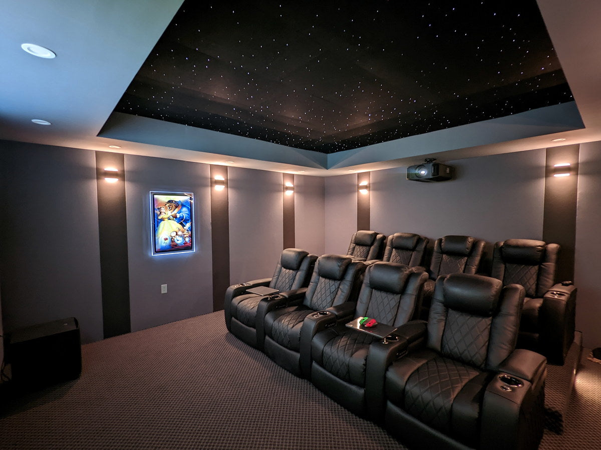 Finished theater seating under a neatly integrated Starlight Ceiling