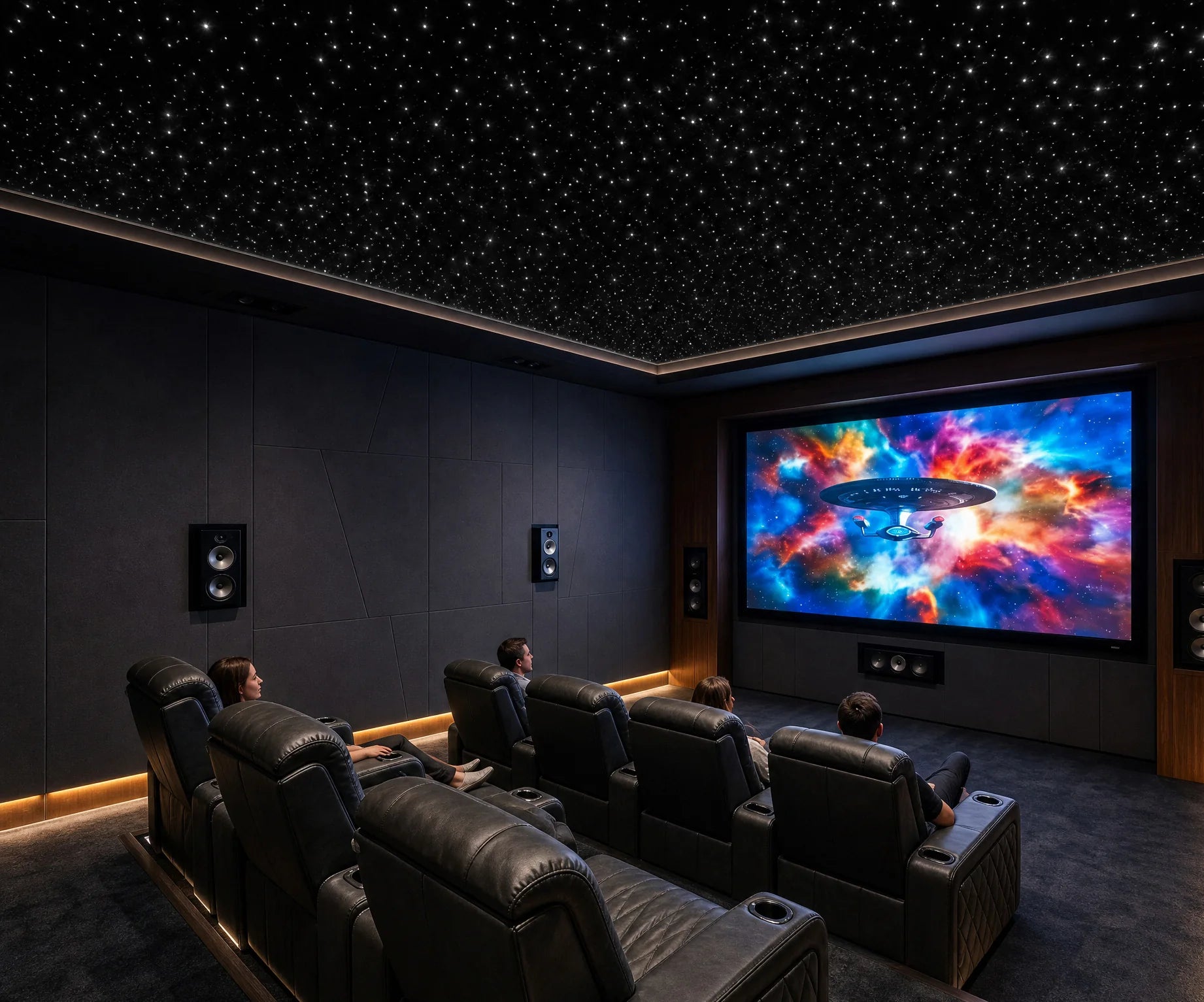 Family enjoying a movie in a dark home theater beneath a white starlight ceiling
